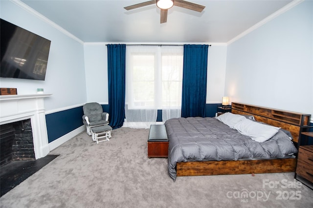 447 N Washington St, Rutherfordton, NC 28139 - carpeted bedroom with a fireplace with flush hearth, baseboards, ornamental molding, and a ceiling fan