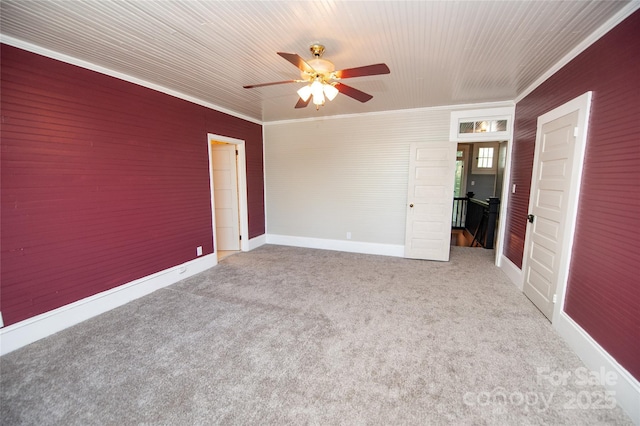 447 N Washington St, Rutherfordton, NC 28139 - unfurnished room with carpet flooring, baseboards, a ceiling fan, and ornamental molding