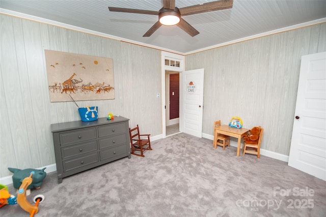 447 N Washington St, Rutherfordton, NC 28139 - interior space featuring ceiling fan, baseboards, ornamental molding, and carpet