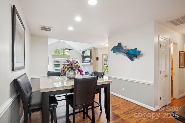7444 Hurstbourne Green Dr, Charlotte, NC 28277 - dining room with visible vents, ceiling fan, baseboards, and wood finished floors