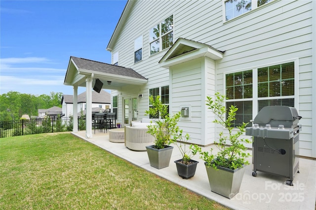 exterior space featuring a yard, a patio area, and fence