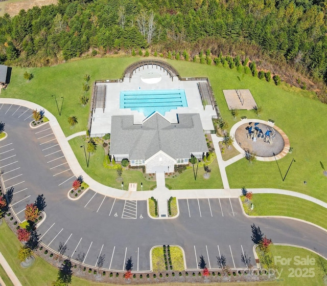 aerial view featuring a forest view