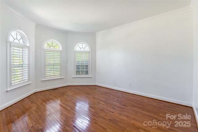 4333 Sawmill Trace Dr, Charlotte, NC 28213 - empty room featuring crown molding, visible vents, hardwood / wood-style floors, and plenty of natural light