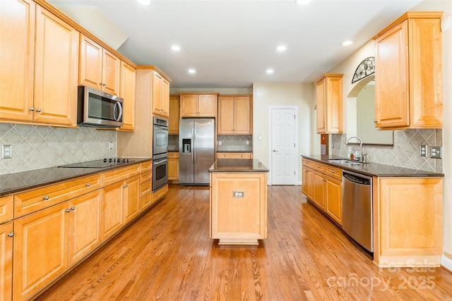 4333 Sawmill Trace Dr, Charlotte, NC 28213 - kitchen with tasteful backsplash, a center island, dark countertops, a sink, and stainless steel appliances