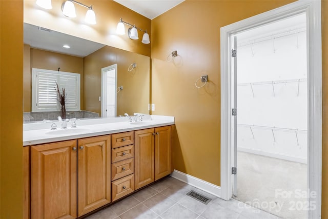 4333 Sawmill Trace Dr, Charlotte, NC 28213 - full bath featuring tile patterned flooring, double vanity, baseboards, and a sink