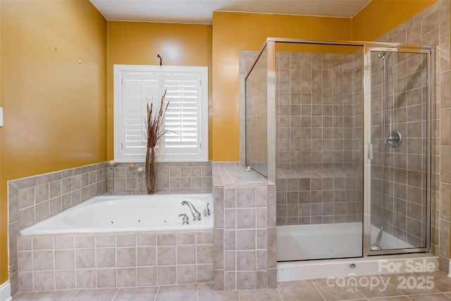 4333 Sawmill Trace Dr, Charlotte, NC 28213 - bathroom featuring tile patterned flooring, a bath, and a stall shower