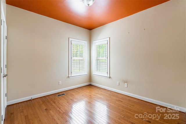 4333 Sawmill Trace Dr, Charlotte, NC 28213 - spare room with light wood-type flooring, baseboards, and visible vents