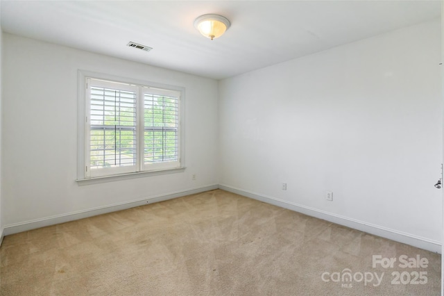 4333 Sawmill Trace Dr, Charlotte, NC 28213 - spare room with light carpet, baseboards, and visible vents
