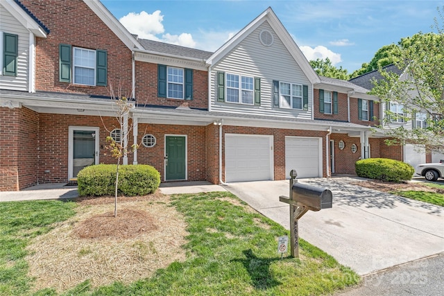 2059 Lennox Square Rd, Charlotte, NC 28210 - multi unit property featuring concrete driveway, an attached garage, and brick siding