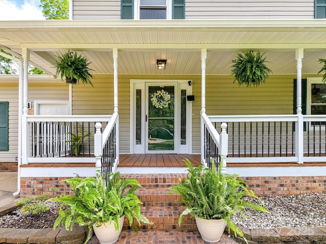 915 Gate Rd, Monroe, NC 28112 - doorway to property featuring a porch