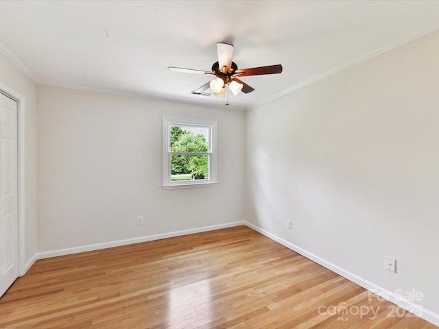 915 Gate Rd, Monroe, NC 28112 - spare room featuring crown molding, ceiling fan, light wood-style floors, and baseboards