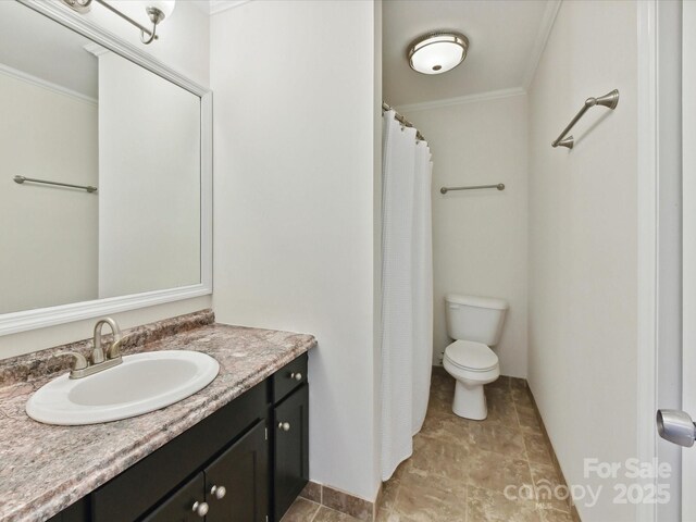 915 Gate Rd, Monroe, NC 28112 - full bath featuring ornamental molding, toilet, vanity, and stone finish flooring