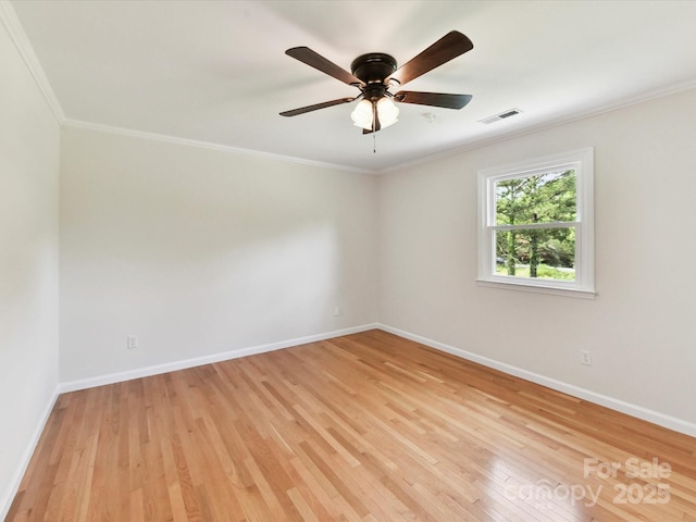 915 Gate Rd, Monroe, NC 28112 - empty room with crown molding, light wood-style floors, baseboards, and a ceiling fan