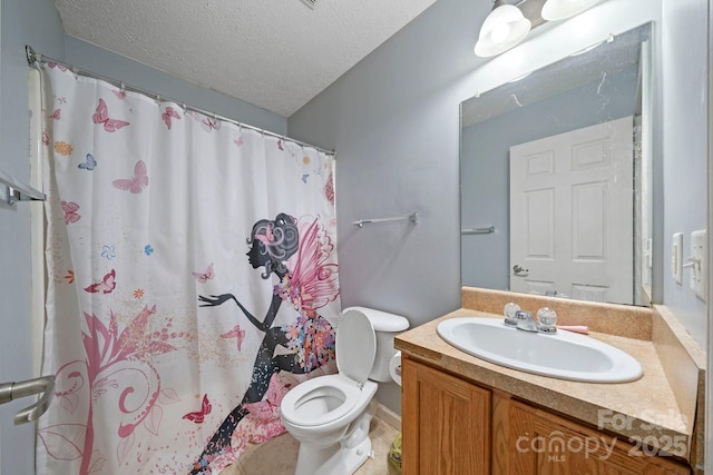 full bathroom featuring toilet, vanity, a textured ceiling, curtained shower, and tile patterned flooring