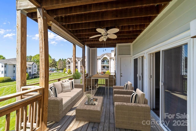 18700 Nautical Dr Unit 203, Cornelius, NC 28031 - wooden deck featuring ceiling fan, a residential view, and an outdoor hangout area