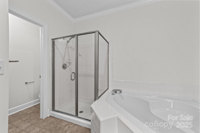 18700 Nautical Dr Unit 203, Cornelius, NC 28031 - bathroom featuring a bath, a shower stall, and ornamental molding
