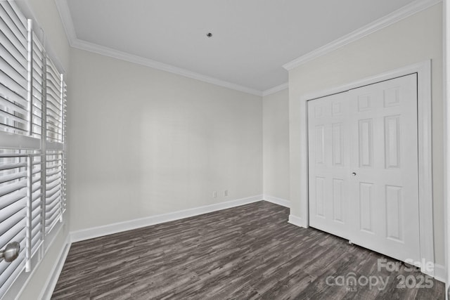 18700 Nautical Dr Unit 203, Cornelius, NC 28031 - unfurnished bedroom with crown molding, dark wood-style flooring, and a closet