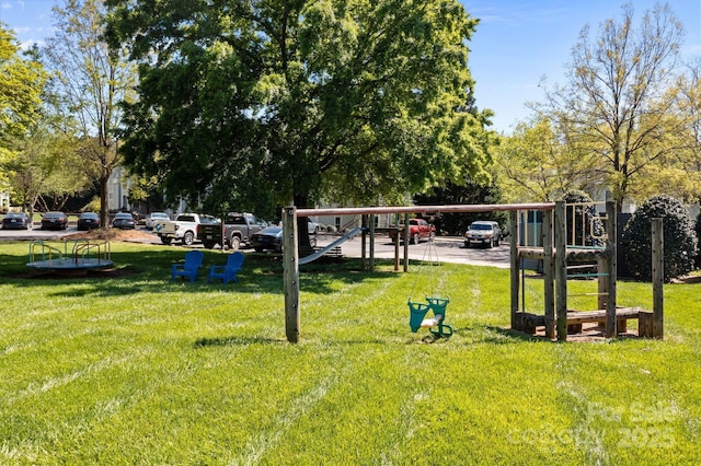 18700 Nautical Dr Unit 203, Cornelius, NC 28031 - view of green lawn featuring a carport