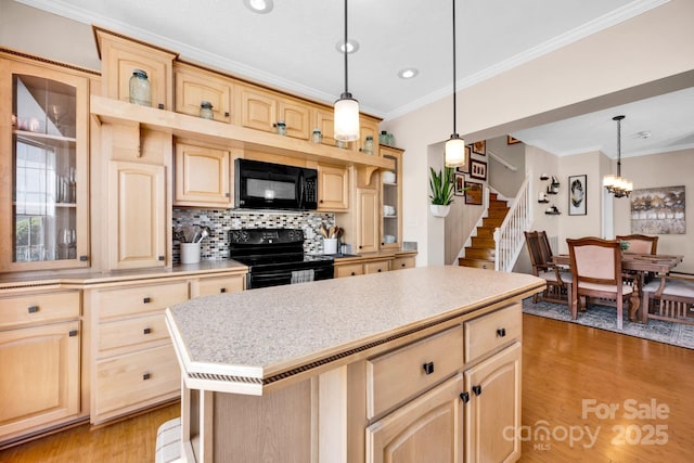 126 Top Flite Dr, Statesville, NC 28677 - kitchen with light brown cabinets, black appliances, crown molding, and light countertops