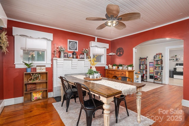 211 Hershel Lackey Rd, Lincolnton, NC 28092 - dining space with ceiling fan, arched walkways, crown molding, and wood finished floors