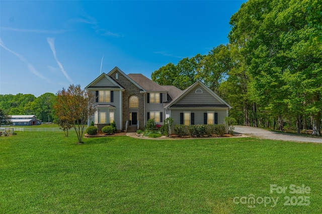 view of front of home with a front yard