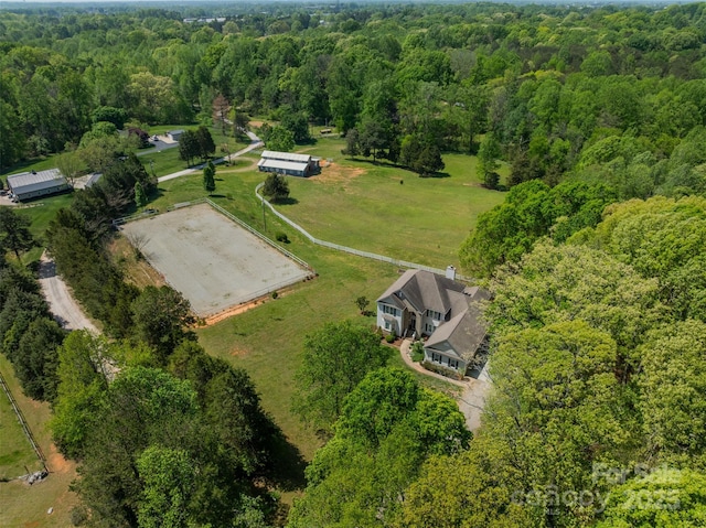 drone / aerial view with a view of trees