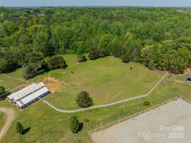 aerial view with a rural view and a forest view