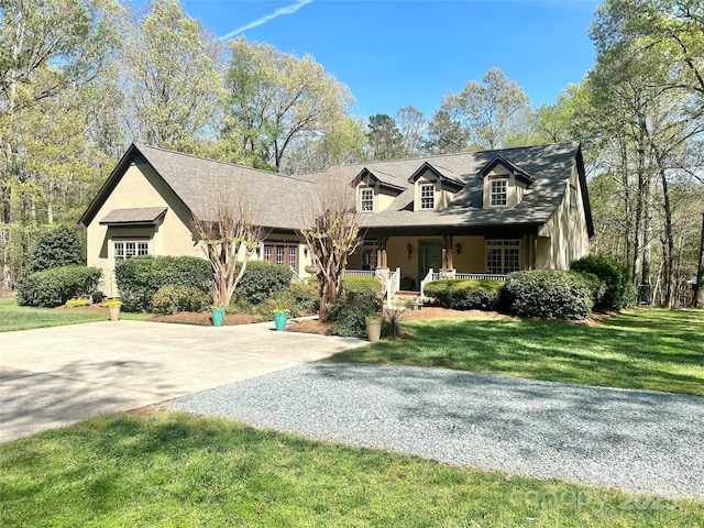 4925 Pageland Hwy, Monroe, NC 28112 - cape cod home featuring covered porch and a front yard