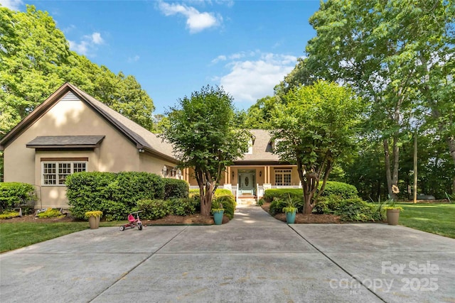 4925 Pageland Hwy, Monroe, NC 28112 - view of front of house featuring covered porch and stucco siding