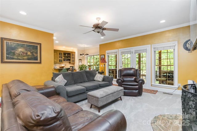 4925 Pageland Hwy, Monroe, NC 28112 - living area featuring carpet floors, ornamental molding, ceiling fan with notable chandelier, and recessed lighting