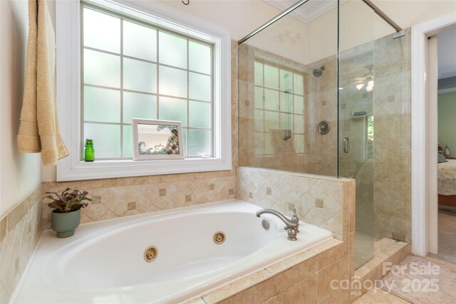 4925 Pageland Hwy, Monroe, NC 28112 - full bathroom with a ceiling fan, a jetted tub, and a stall shower