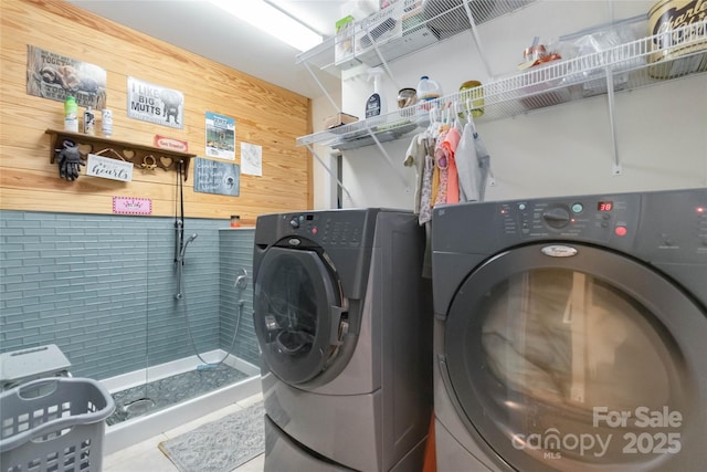 4925 Pageland Hwy, Monroe, NC 28112 - clothes washing area featuring wooden walls, laundry area, and washing machine and clothes dryer