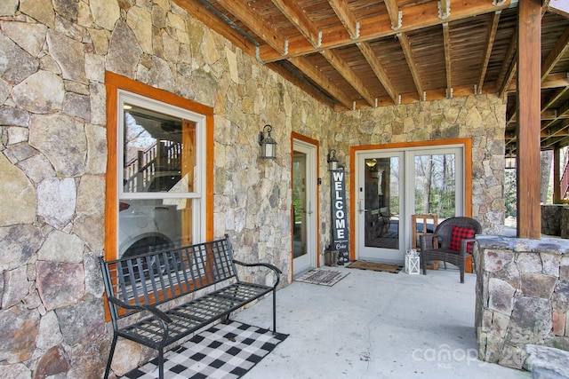 475 S Toe River Rd, Burnsville, NC 28714 - view of exterior entry with french doors and stone siding
