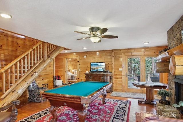 475 S Toe River Rd, Burnsville, NC 28714 - rec room with ceiling fan, a fireplace, wood finished floors, wood walls, and pool table