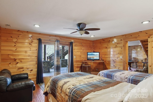 475 S Toe River Rd, Burnsville, NC 28714 - bedroom featuring wood walls, recessed lighting, access to outside, and wood finished floors