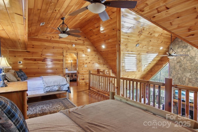 475 S Toe River Rd, Burnsville, NC 28714 - bedroom with wooden walls, lofted ceiling, wood finished floors, and wood ceiling