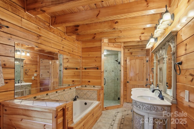 475 S Toe River Rd, Burnsville, NC 28714 - bathroom featuring double vanity, a stall shower, wooden walls, a bath, and beamed ceiling