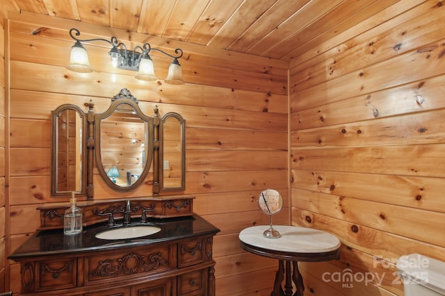 475 S Toe River Rd, Burnsville, NC 28714 - bathroom with wooden ceiling, wooden walls, and vanity