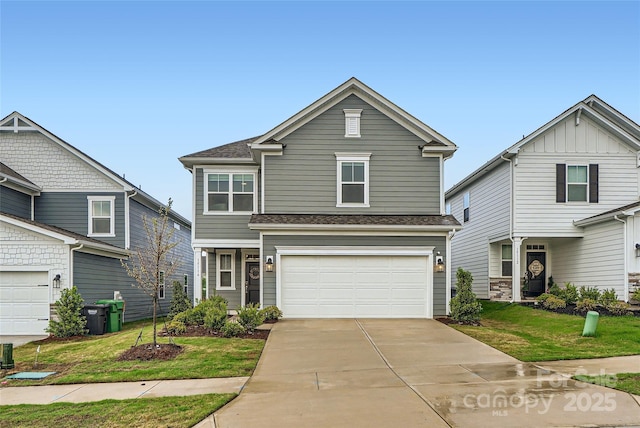 traditional home featuring concrete driveway, a front lawn, roof with shingles, and a garage