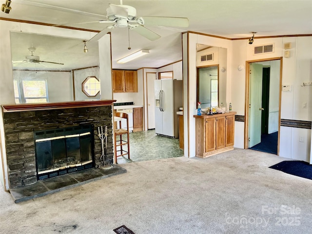 105 Branson Dr, Olin, NC 28660 - living room featuring a fireplace, visible vents, carpet floors, and ceiling fan