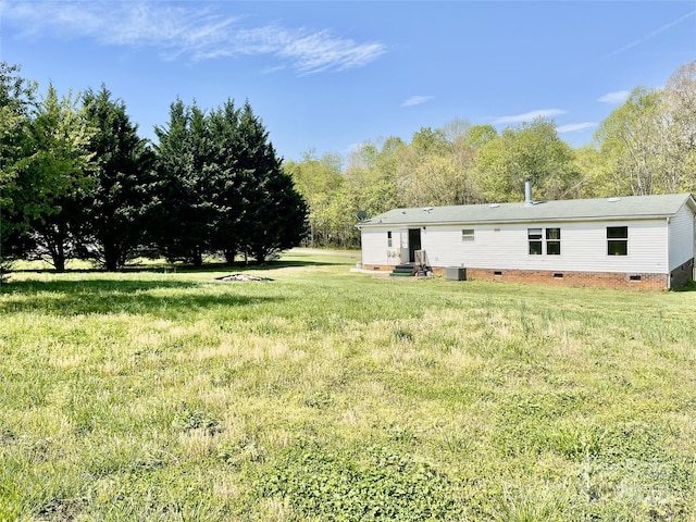 105 Branson Dr, Olin, NC 28660 - view of yard with entry steps and cooling unit