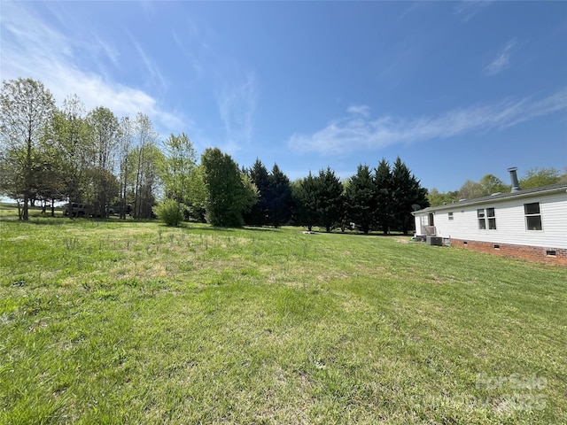 105 Branson Dr, Olin, NC 28660 - view of yard featuring central AC