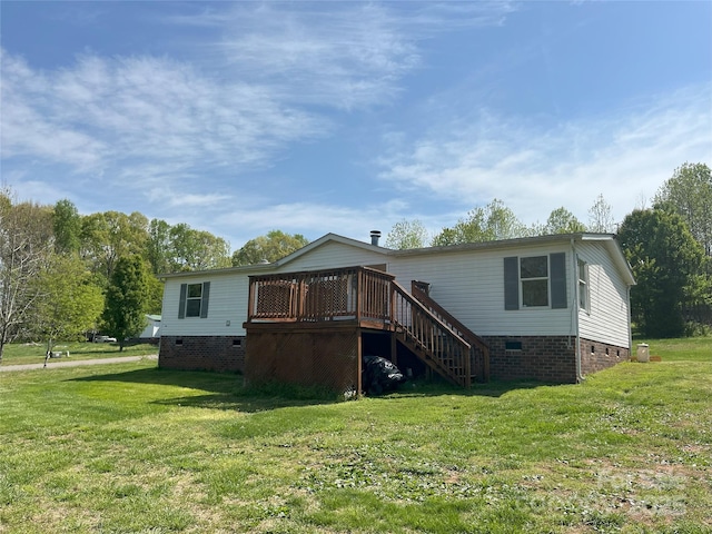 105 Branson Dr, Olin, NC 28660 - rear view of property featuring a yard, a wooden deck, crawl space, and stairs