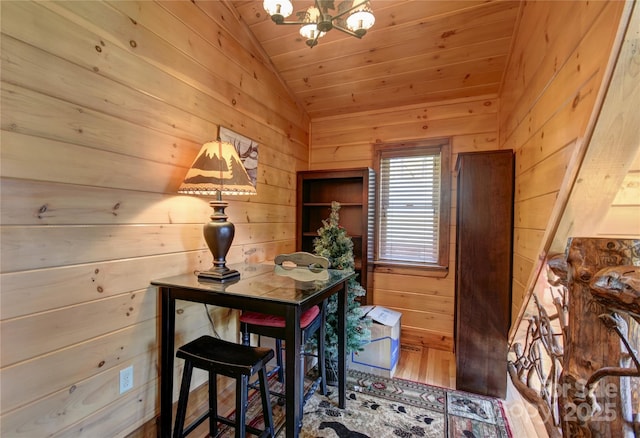36 Destiny Trl, Maggie Valley, NC 28751 - dining area with wooden walls, vaulted ceiling, a chandelier, wood finished floors, and wood ceiling