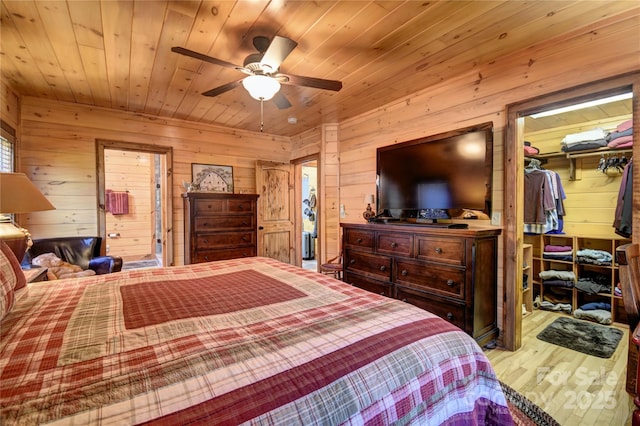36 Destiny Trl, Maggie Valley, NC 28751 - bedroom with wood walls, wood ceiling, wood finished floors, a walk in closet, and a closet