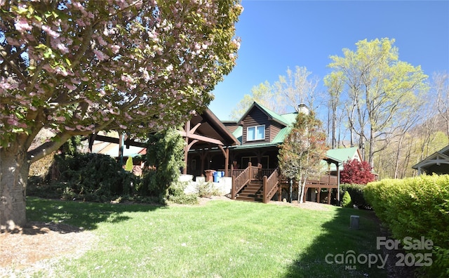 36 Destiny Trl, Maggie Valley, NC 28751 - rear view of property with stairs, a lawn, a chimney, and covered porch