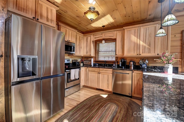 36 Destiny Trl, Maggie Valley, NC 28751 - kitchen with appliances with stainless steel finishes, a sink, light wood-style floors, wooden ceiling, and dark stone countertops