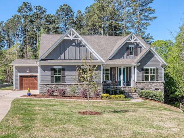 143 Robinson Ridge Dr, Mooresville, NC 28117 - craftsman inspired home featuring board and batten siding, a garage, stone siding, a front lawn, and driveway