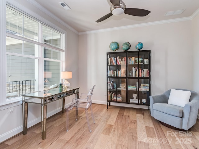 143 Robinson Ridge Dr, Mooresville, NC 28117 - living area featuring baseboards, crown molding, a ceiling fan, visible vents, and light wood finished floors