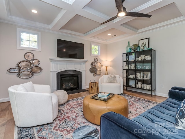143 Robinson Ridge Dr, Mooresville, NC 28117 - living room featuring ornamental molding, a wealth of natural light, a ceiling fan, and a fireplace with flush hearth